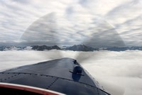 Piercing through the clouds.