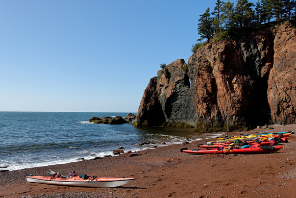 Kayaks on the beach.